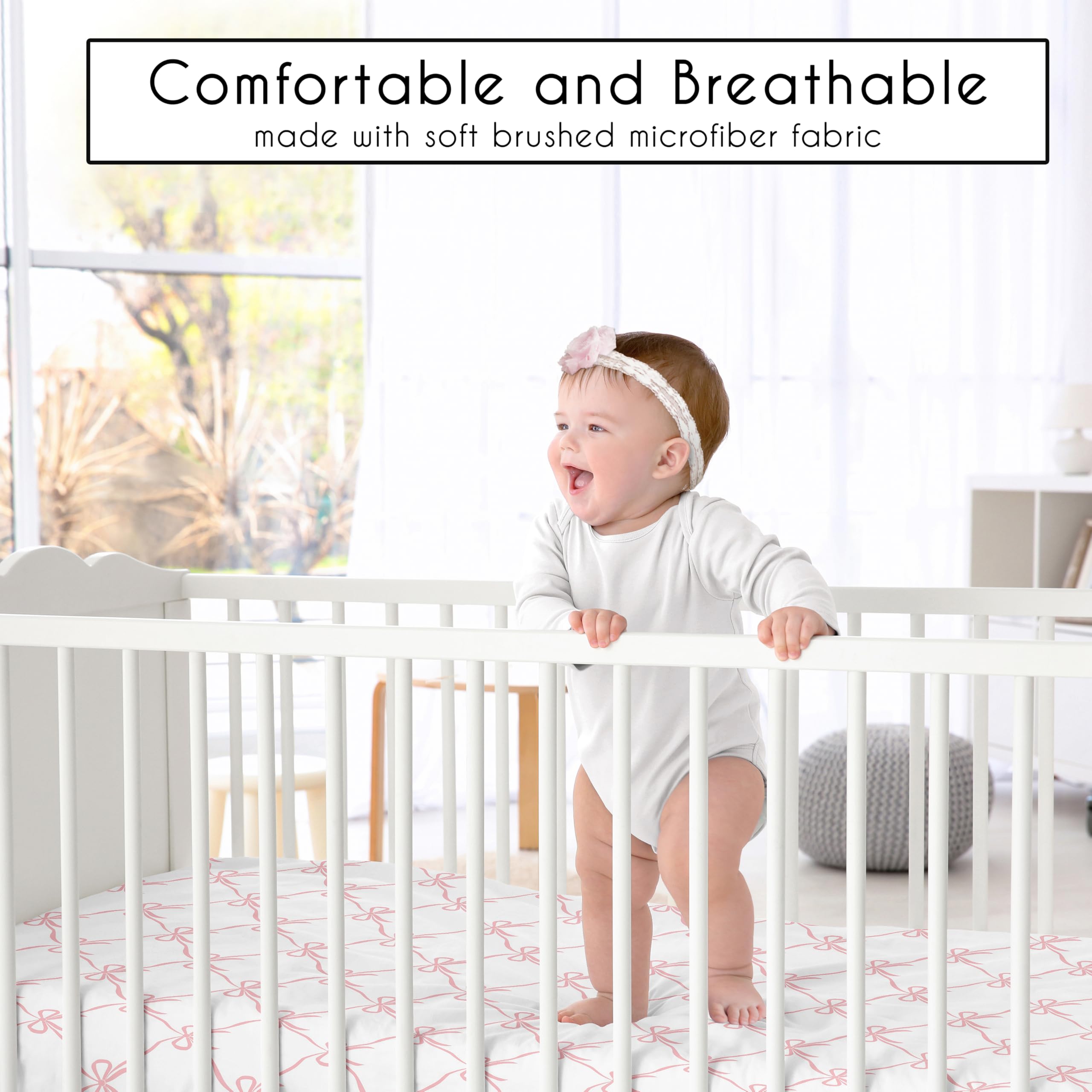 Sweet Jojo Designs pink bows crib sheet folded; easy storage and quick changes.
