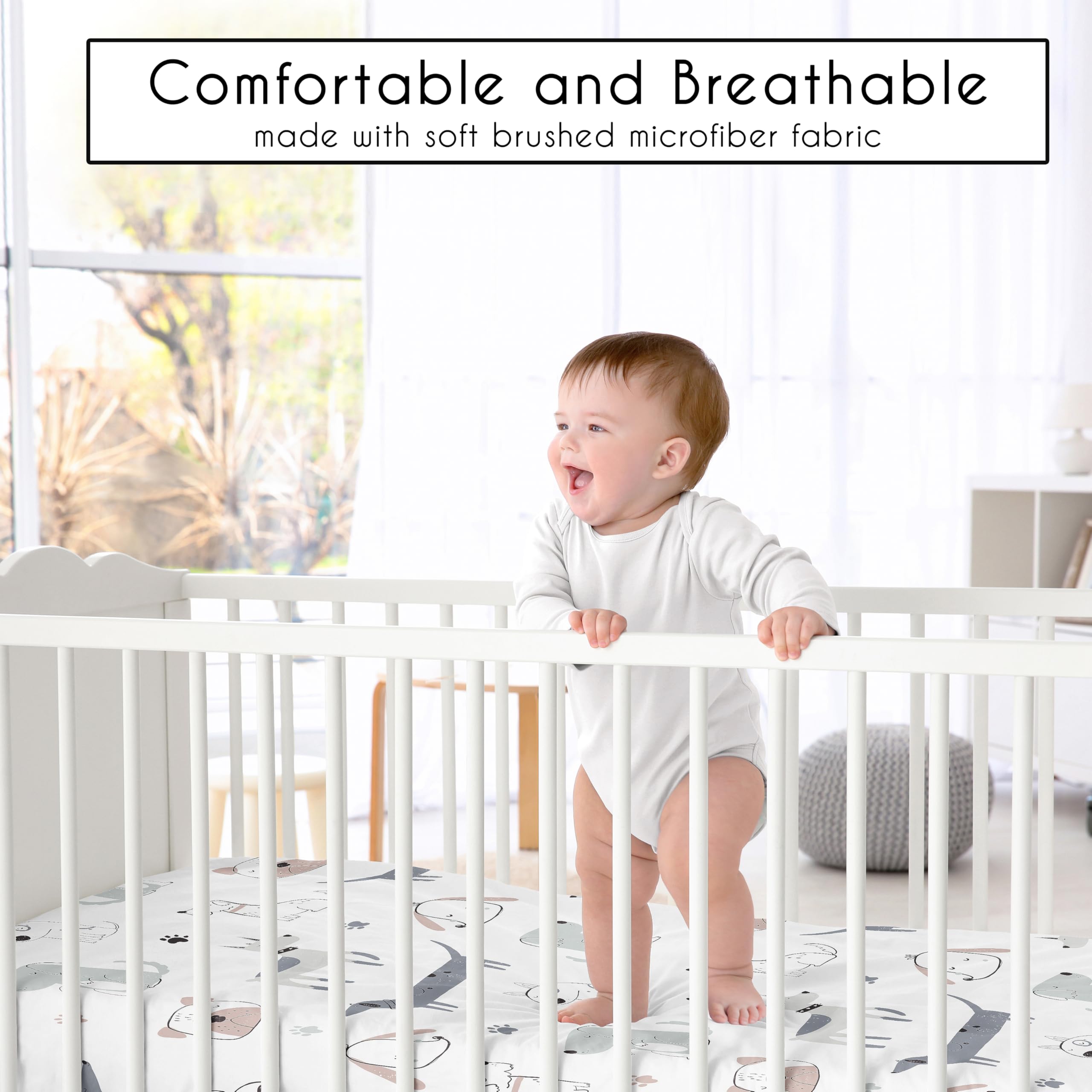 Sweet Jojo Designs Puppy Dog crib sheet on a crib demonstrates snug fit with full elastic edge