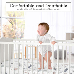 Sweet Jojo Designs Puppy Dog crib sheet on a crib demonstrates snug fit with full elastic edge