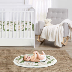 Sweet Jojo Designs sage green boho flower playmat folded for easy storage.