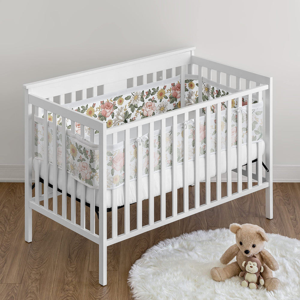 Sweet Jojo Designs short panel mesh liner keeps crib edges secure and tidy.