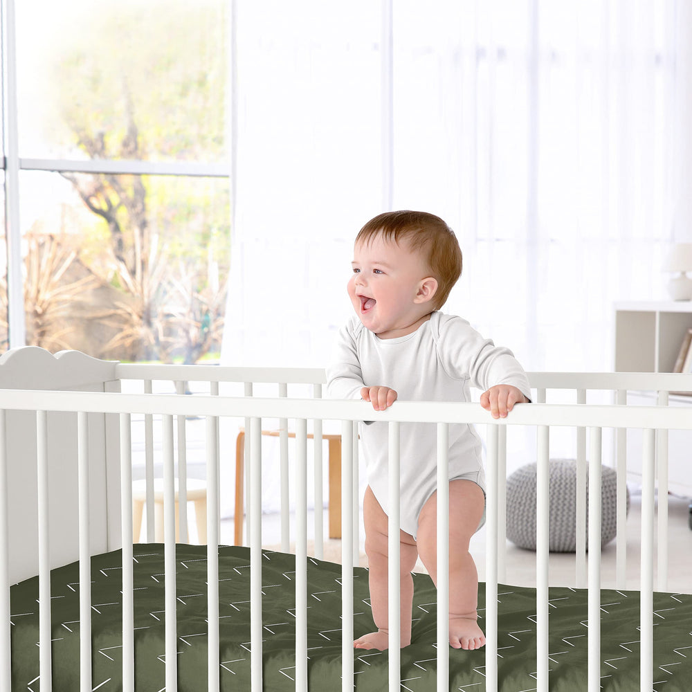 Sweet Jojo Designs snug-fit 52x28x8 crib sheet with secure elastic edge