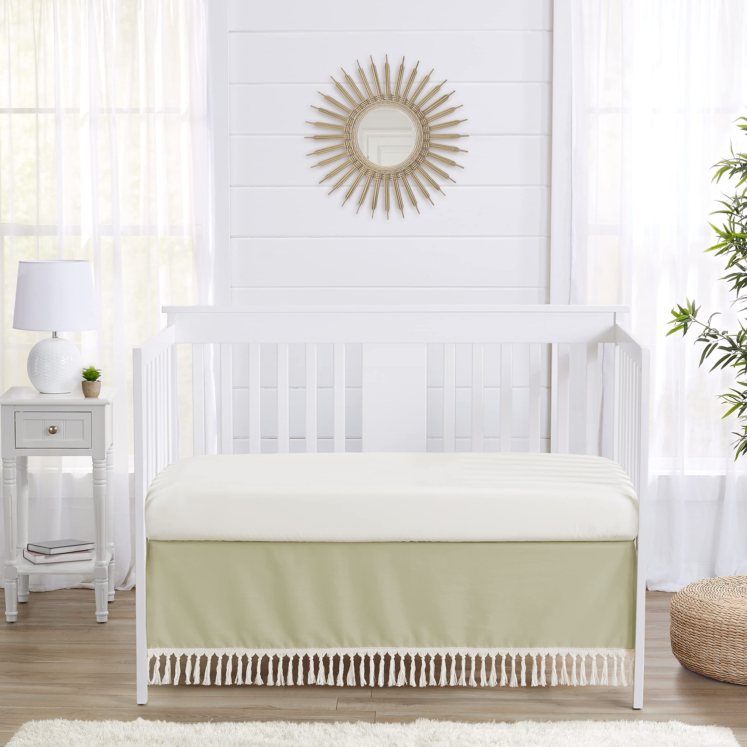 Sweet Jojo Designs sage green crib skirt tassel detail enhances cozy nursery aesthetics and hide-away storage area