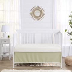 Sweet Jojo Designs sage green crib skirt tassel detail enhances cozy nursery aesthetics and hide-away storage area