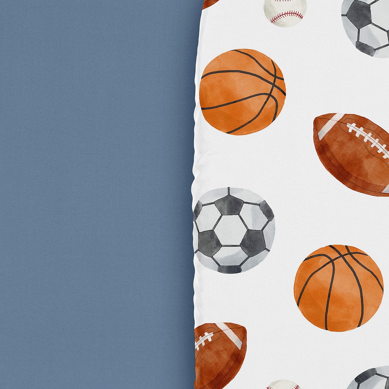 Sweet Jojo Designs sport-theme bassinet sheets blue print close-up highlights soft microfiber.