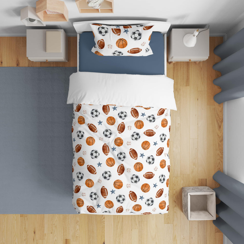 Sweet Jojo Designs sham with football and basketball accents for coordinated room decor