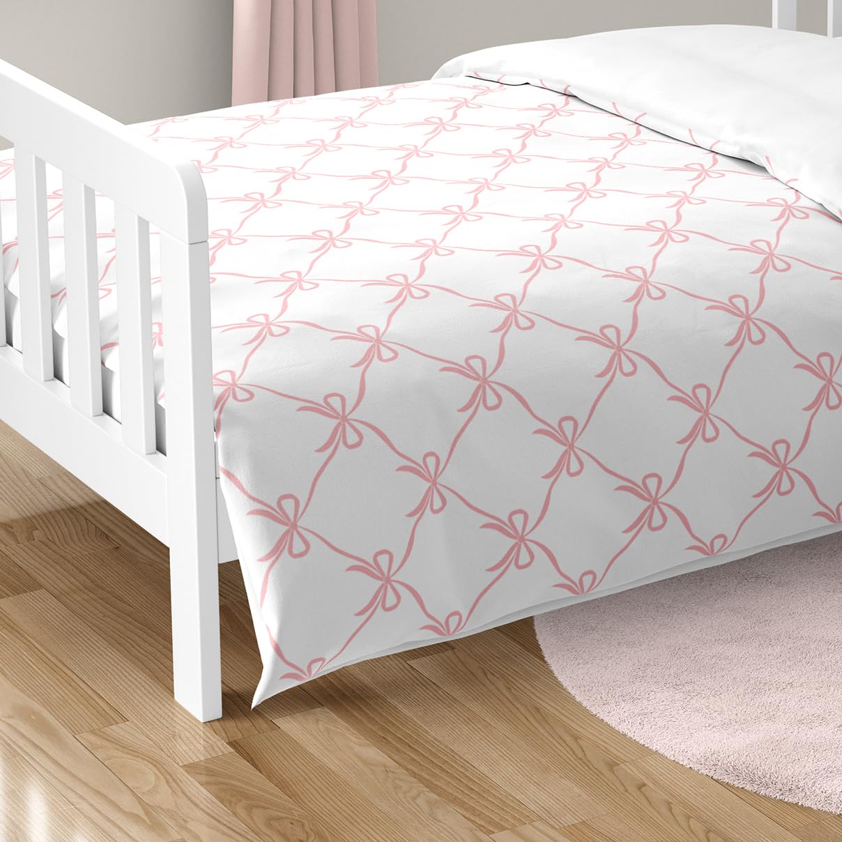 Sweet Jojo Designs pink bows print detail highlights flowy ribbons and satin bows