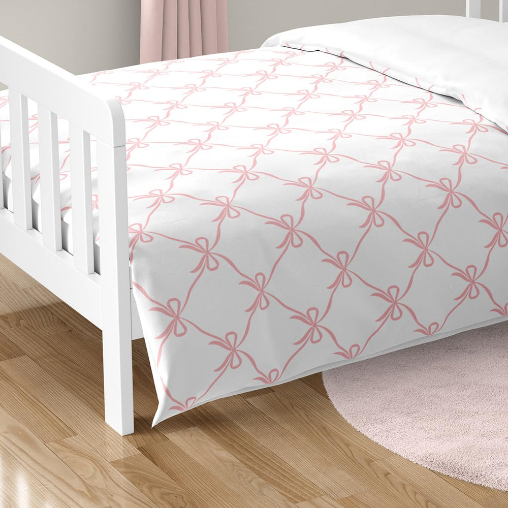 Sweet Jojo Designs pink bows print detail highlights flowy ribbons and satin bows