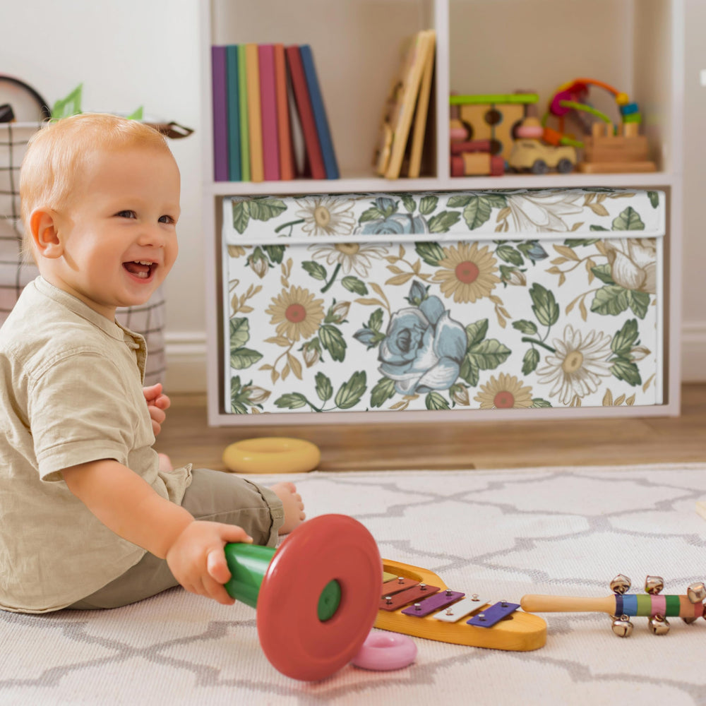 Sweet Jojo Designs vintage floral fabric detail highlights soft, kid-friendly storage bin