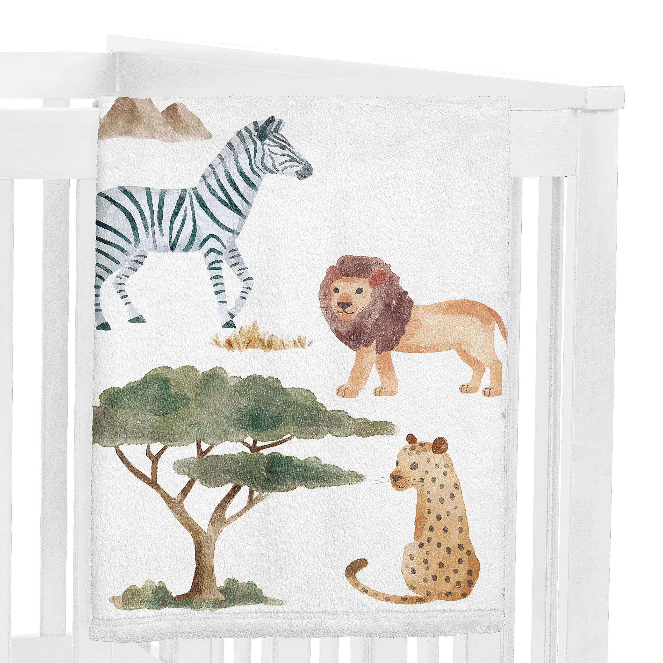 Sweet Jojo Designs watercolor jungle print provides vibrant backdrop for newborn photo shoots