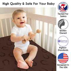 Sweet Jojo Designs crib skirt in brown horseshoe print hides under-crib storage neatly.