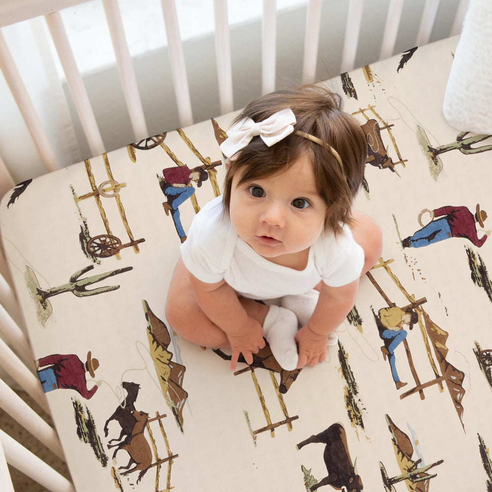 Sweet Jojo Designs cow-print sheets for cozy, breathable infant sleep space