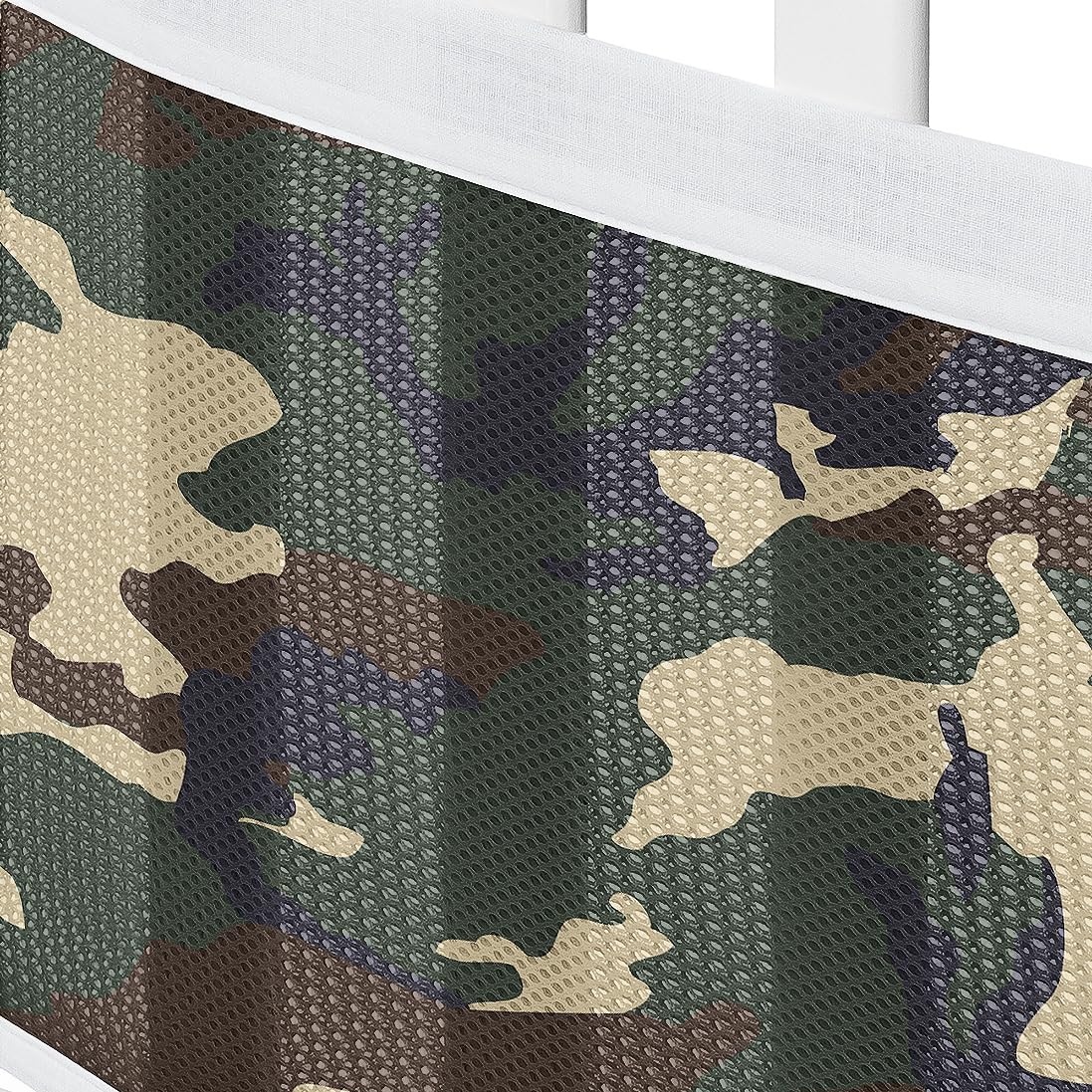 Sweet Jojo Designs woodland camo crib liner closeup shows reinforced edge trim.