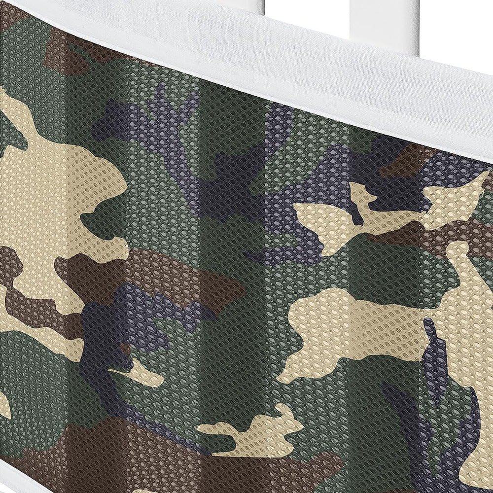 Sweet Jojo Designs woodland camo crib liner closeup shows reinforced edge trim.