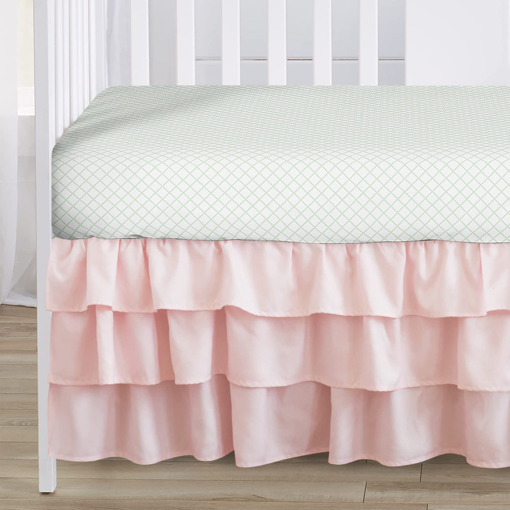 Sweet Jojo Designs woodland deer floral nursery setup pairs with coordinating pieces.