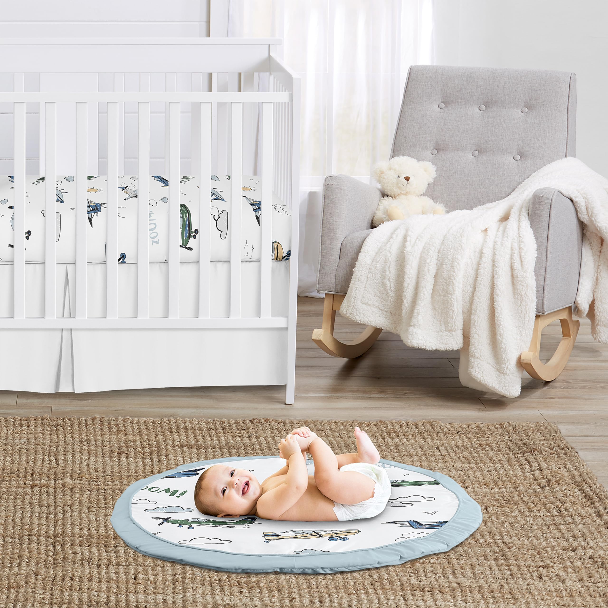 Sweet Jojo Designs Vintage Airplane Play Mat airplane print highlights travel-themed play for babies.