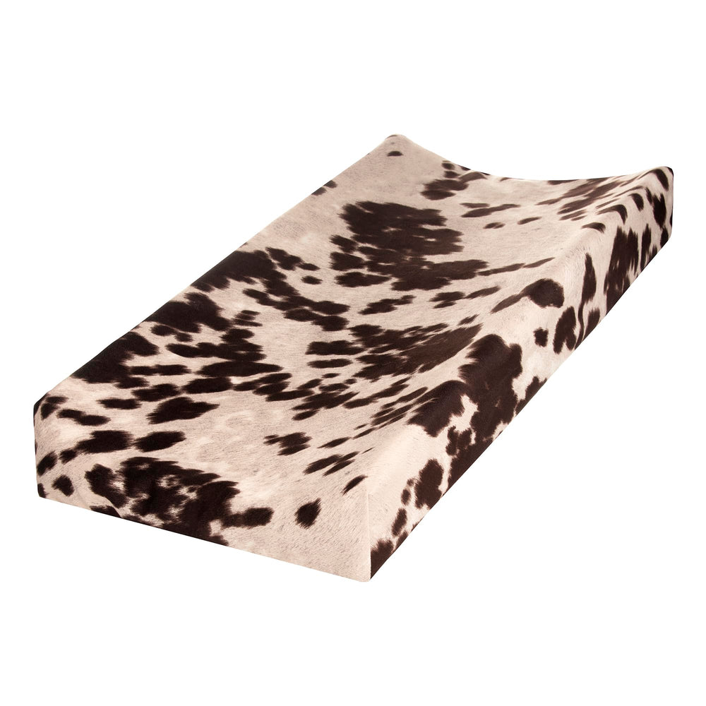 Sweet Potatoes Western Cowboy Changing Pad Cover with cowhide print adds stylish nursery decor and soft comfort.