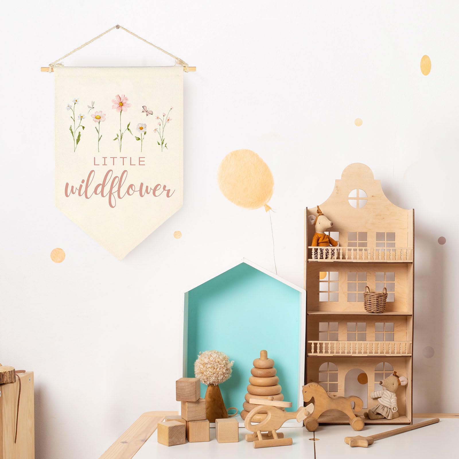 Sweety Baby canvas wall flag boosts boho theme in nursery.