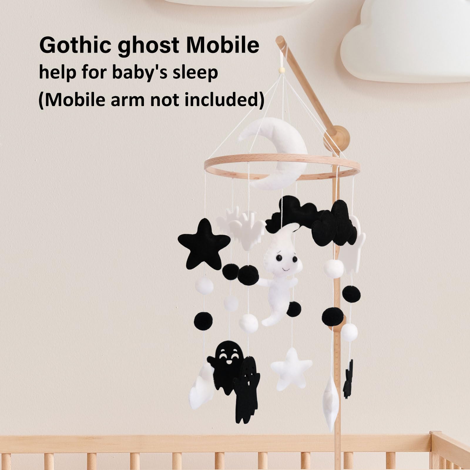 Sweety Baby Ghost Mobile moon emblem invites focused gazing during quiet time.