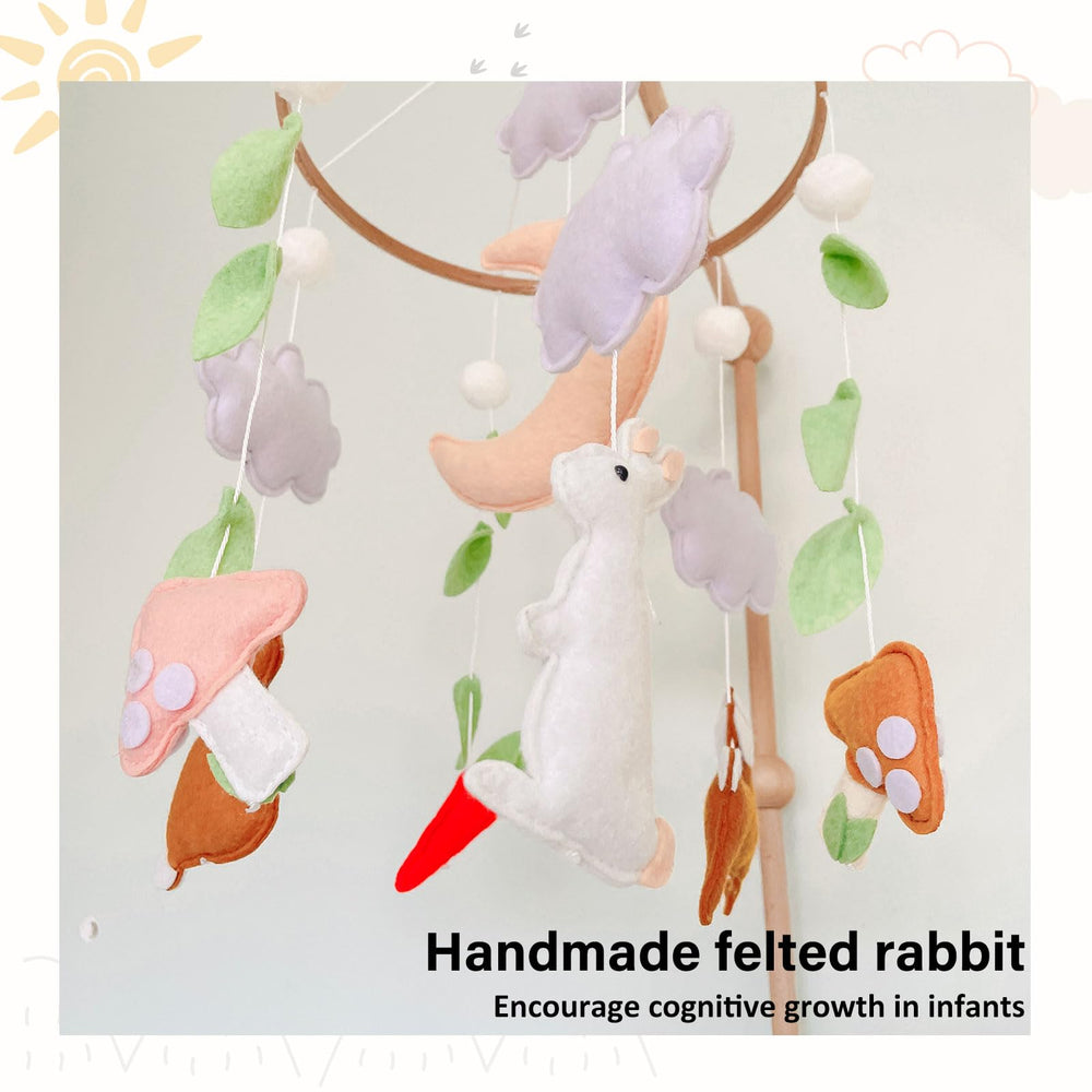 Sweety Baby hand-sewn rabbit mobile brings cozy woodland charm to nursery.