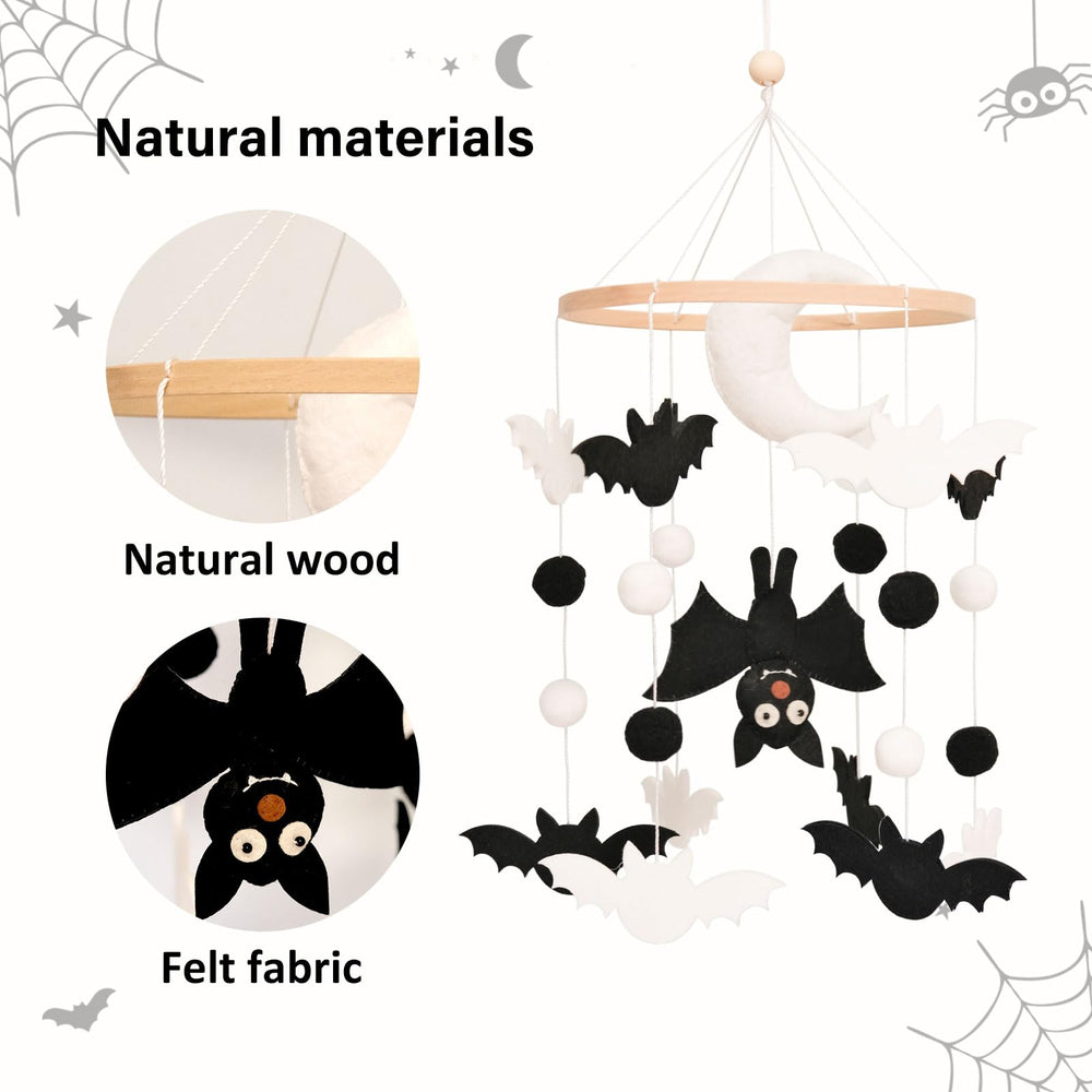 Sweety Baby moon mobile in nursery helps tiny eyes follow shapes.