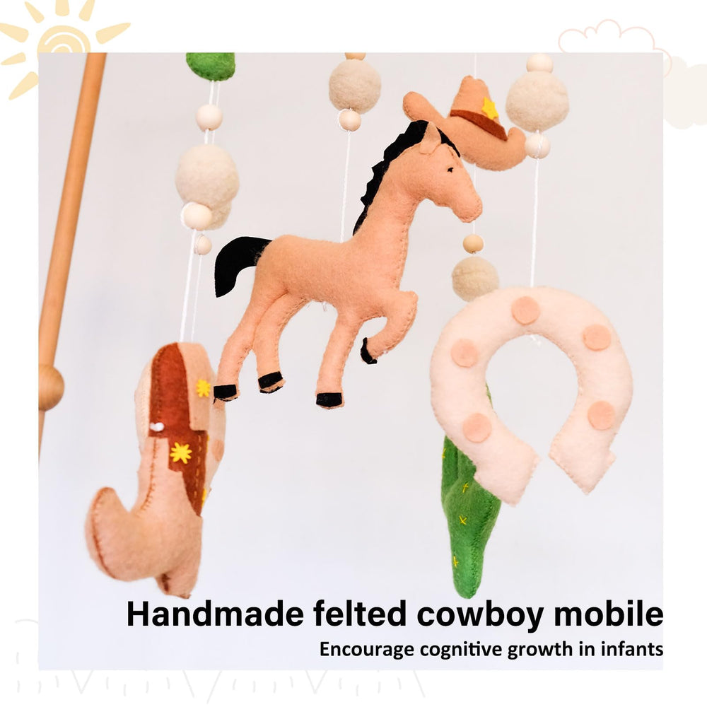 Sweety Baby Western Mobile cactus accents western flair and visual interest.