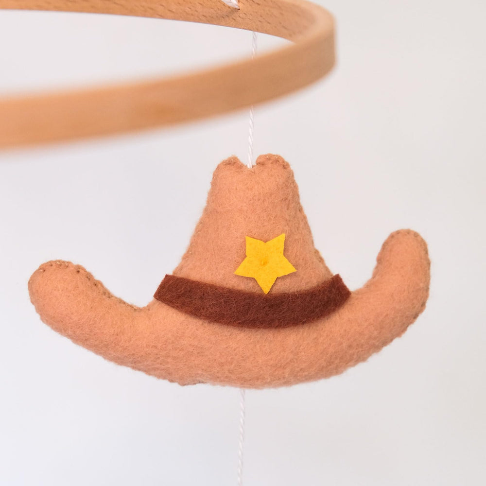 Sweety Baby Western Mobile handmade felt close-up highlights craftsmanship and texture.