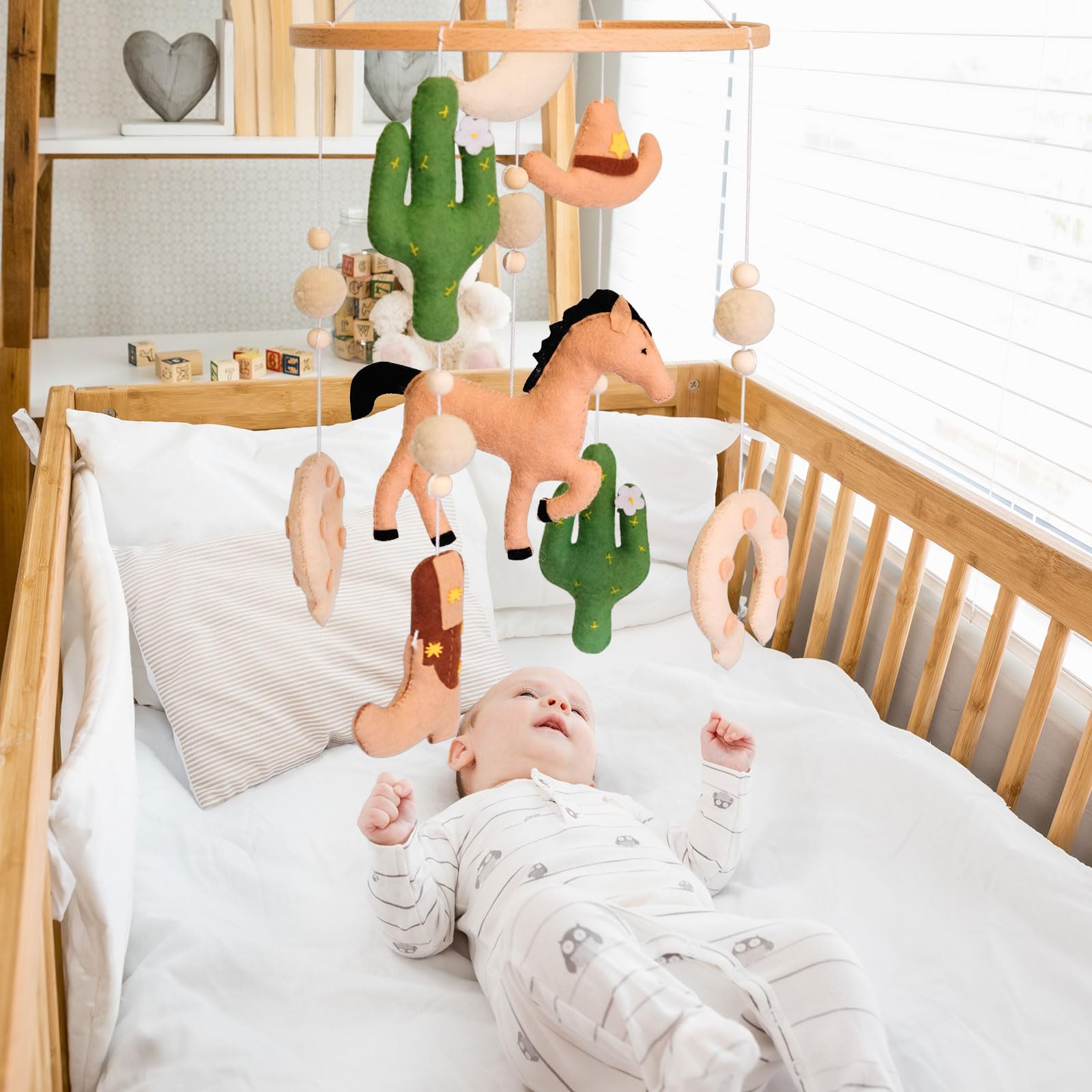 Sweety Baby Western Mobile in neutral tones suits a wide range of nursery styles.