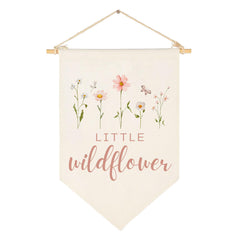 Sweety Baby wildflower banner over crib for cozy boho nursery decor.