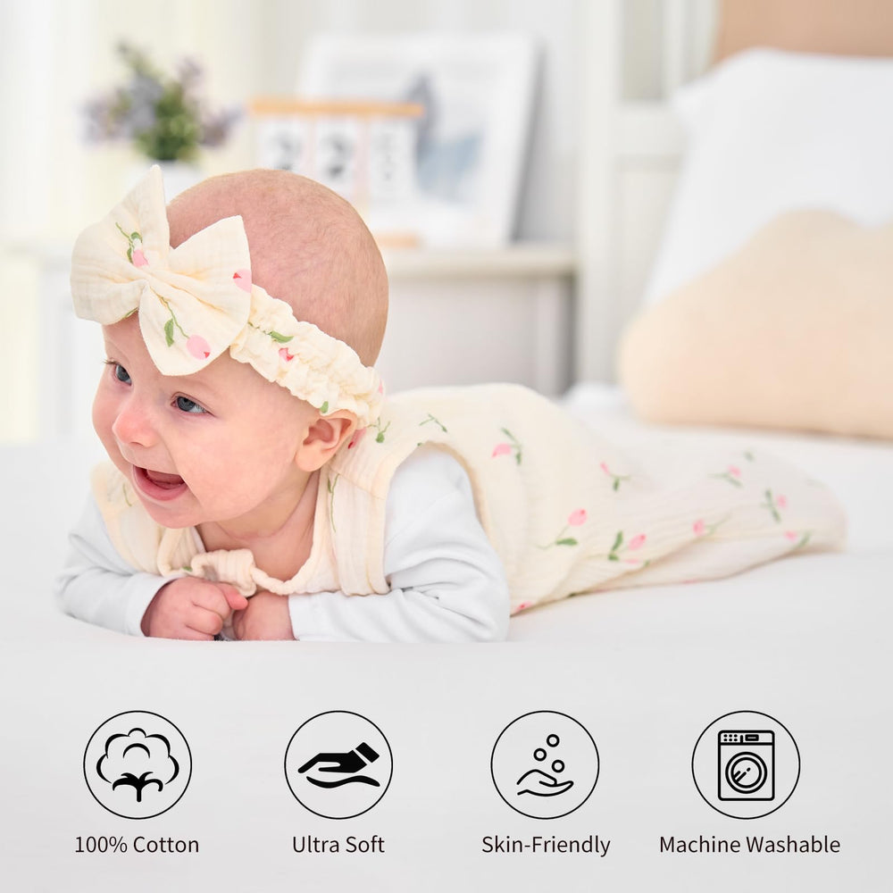 Synrroe newborn wearing sleep sack demonstrates secure, snug fit.