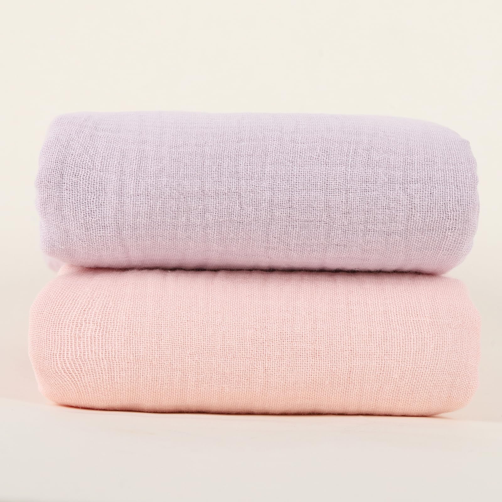 Synrroe baby nursery scene shows soft-touch blanket in crib.