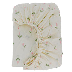 Synrroe crib sheet rose fabric closeup highlighting soft muslin texture for gentle baby skin