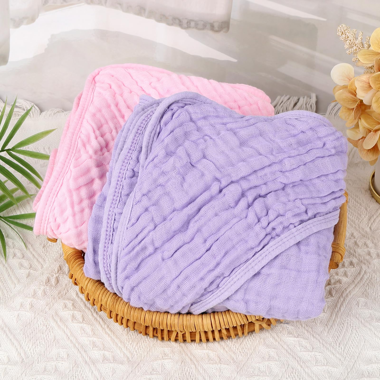 Synrroe hooded muslin towel pink-wrapped baby demonstrates cozy post-bath warmth