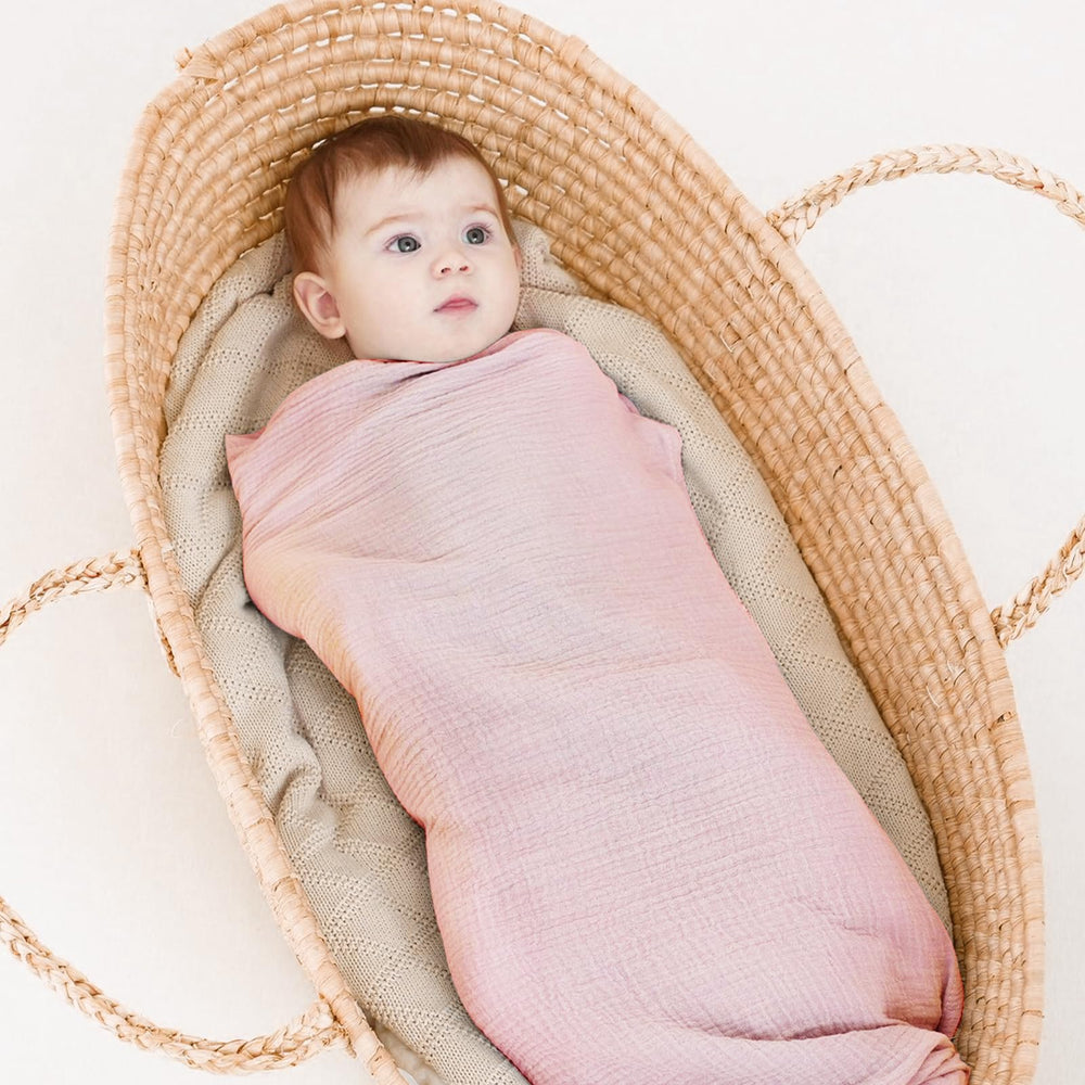 Synrroe muslin swaddle blanket 40x40 on a stroller canopy provides shade and cozy protection.