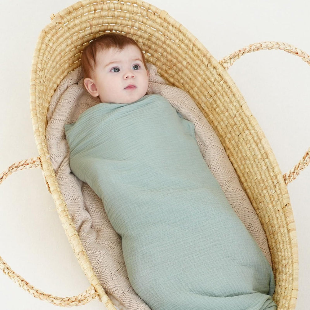 Synrroe muslin swaddle blanket serves as nursing cover for private feeding moments