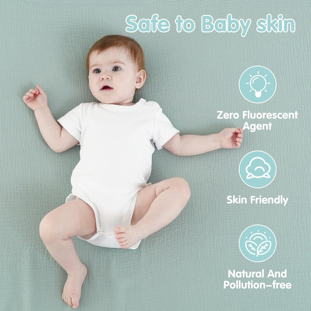 Synrroe muslin swaddle blanket anchors playtime on soft mat surfaces