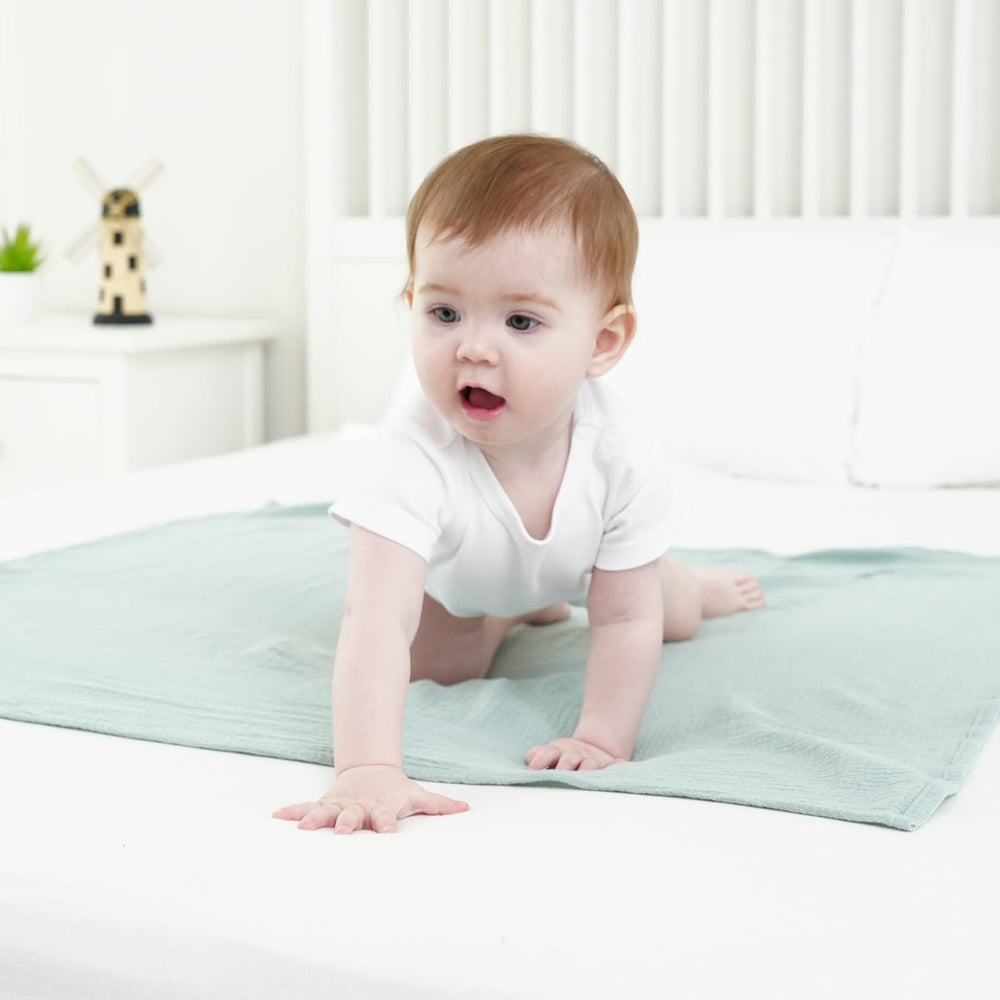 Synrroe muslin swaddle blanket used as stroller cover for sun and wind protection