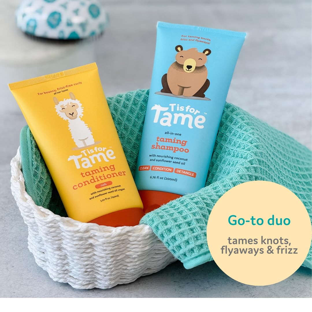 T is for Tame Taming Conditioner bottle dispensing for detangling and smooth curls.