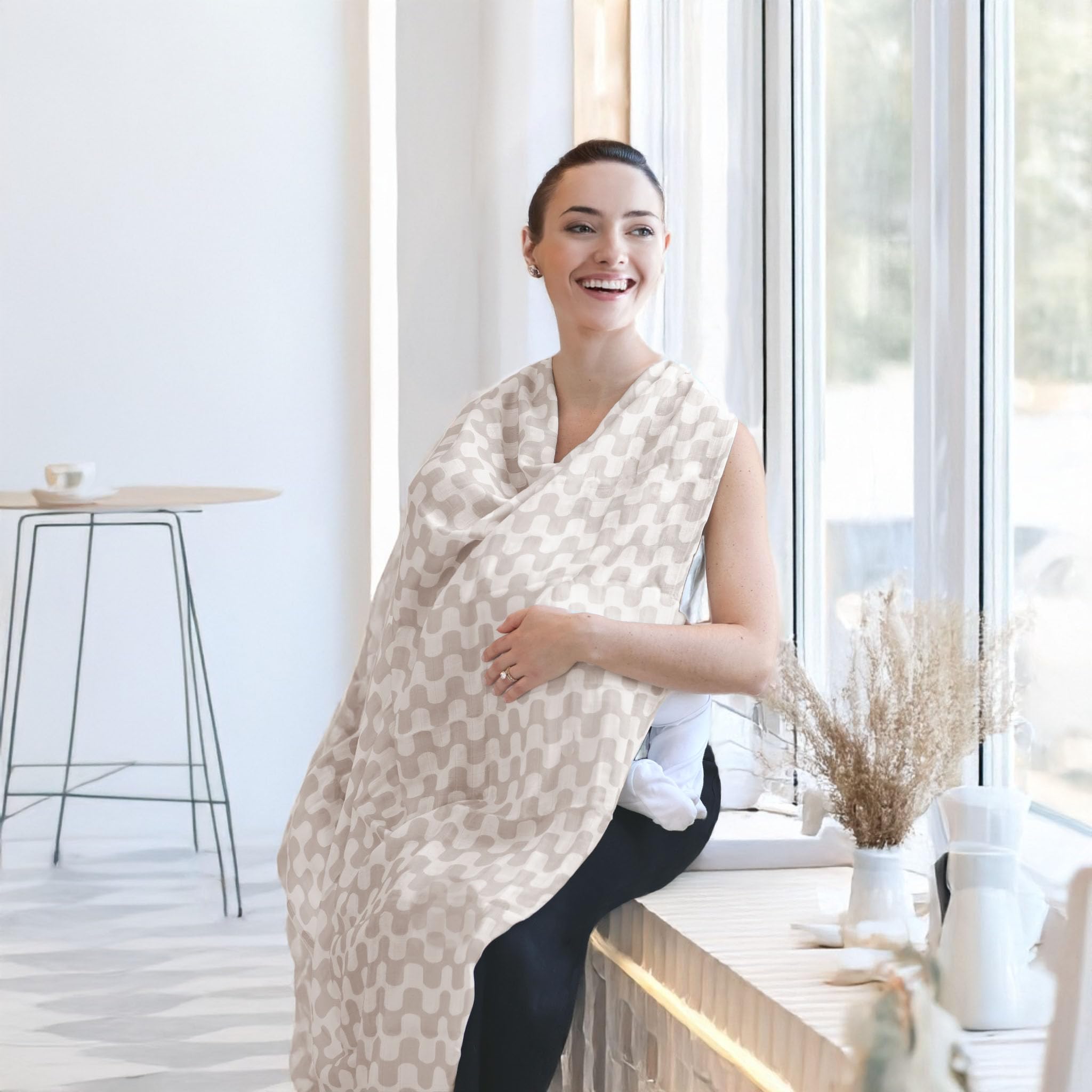 TAB muslin swaddle nursing-cover provides privacy during feeds.