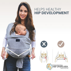 TAB versatile wrap gray model wearing in sling demonstrates ergonomic support.
