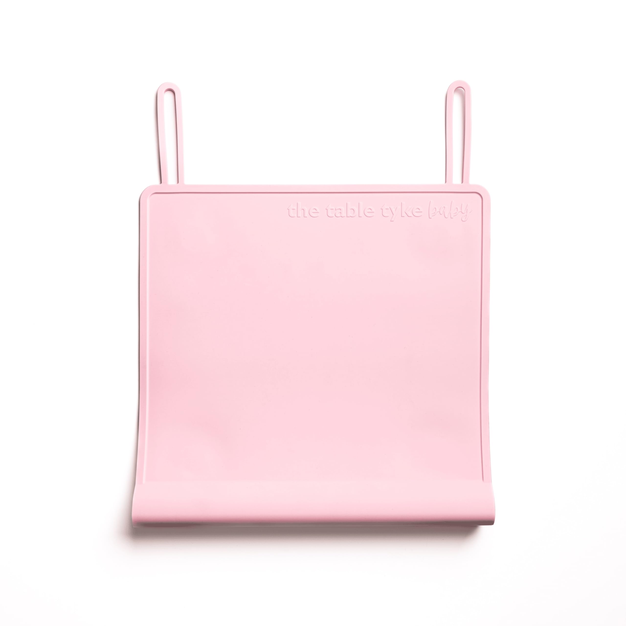 The Table Tyke silicone suction placemat hero view highlights spill containment.
