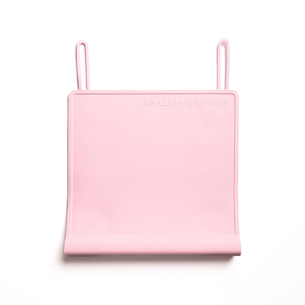 The Table Tyke silicone suction placemat hero view highlights spill containment.