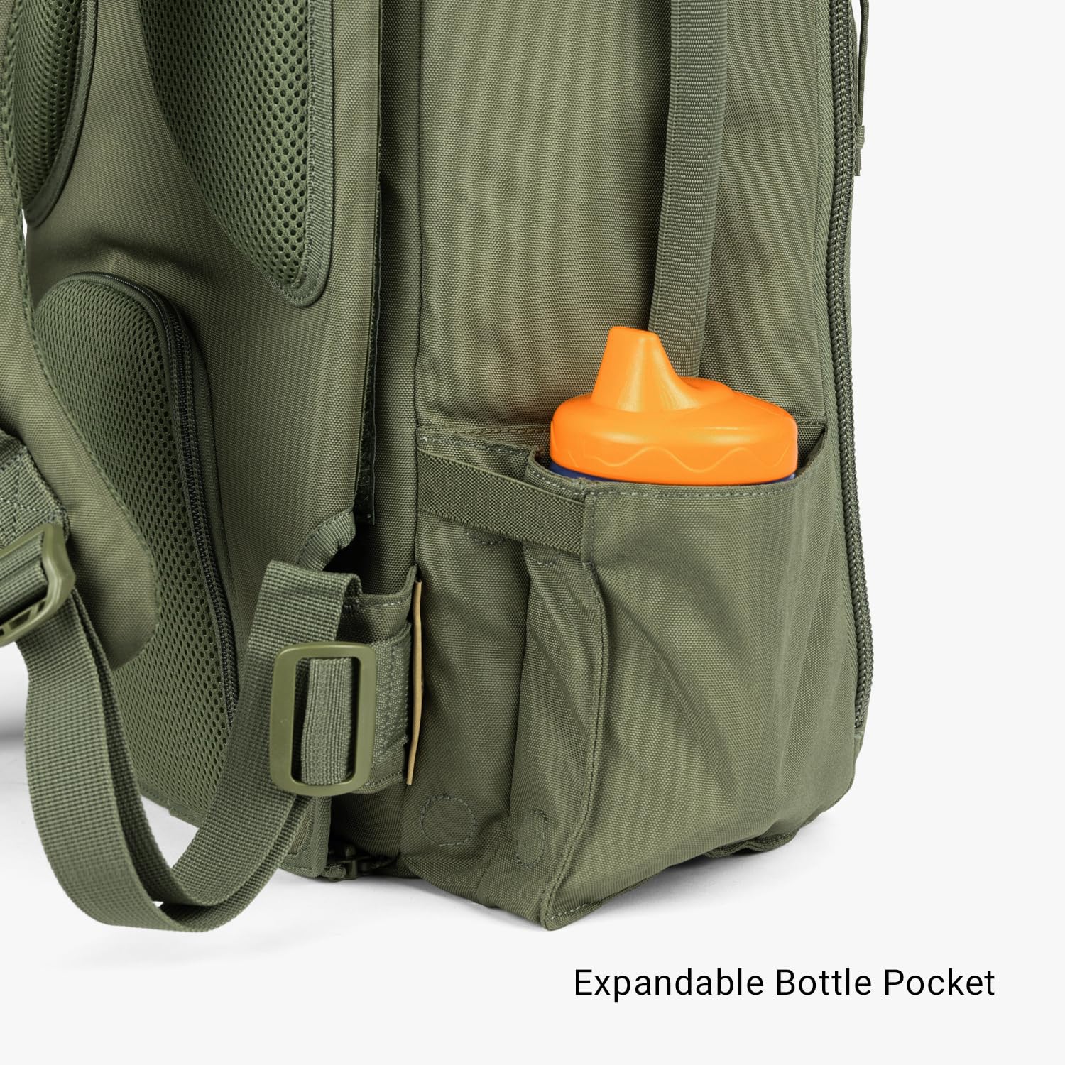 Tactical Baby Gear Daypack water-resistant fabric protects belongings in light rain.