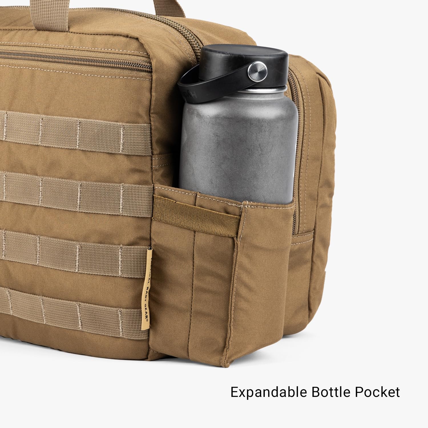 Tactical Baby Gear Deuce 4th Gen included changing mat ready in rear pocket.