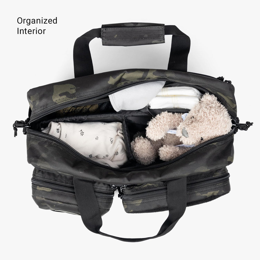 Tactical Baby Gear Deuce Diaper Bag included changing mat ready for on-the-go changes.