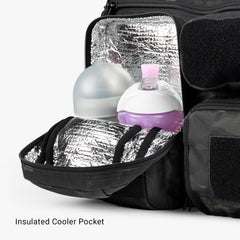 Tactical Baby Gear Deuce Diaper Bag magnetic wipes pocket enables fast diaper changes.