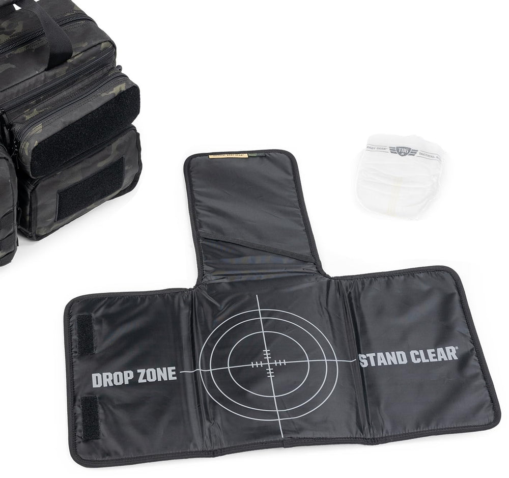 Tactical Baby Gear Deuce Diaper Bag thermal cooler pocket keeps snacks cool on trips.