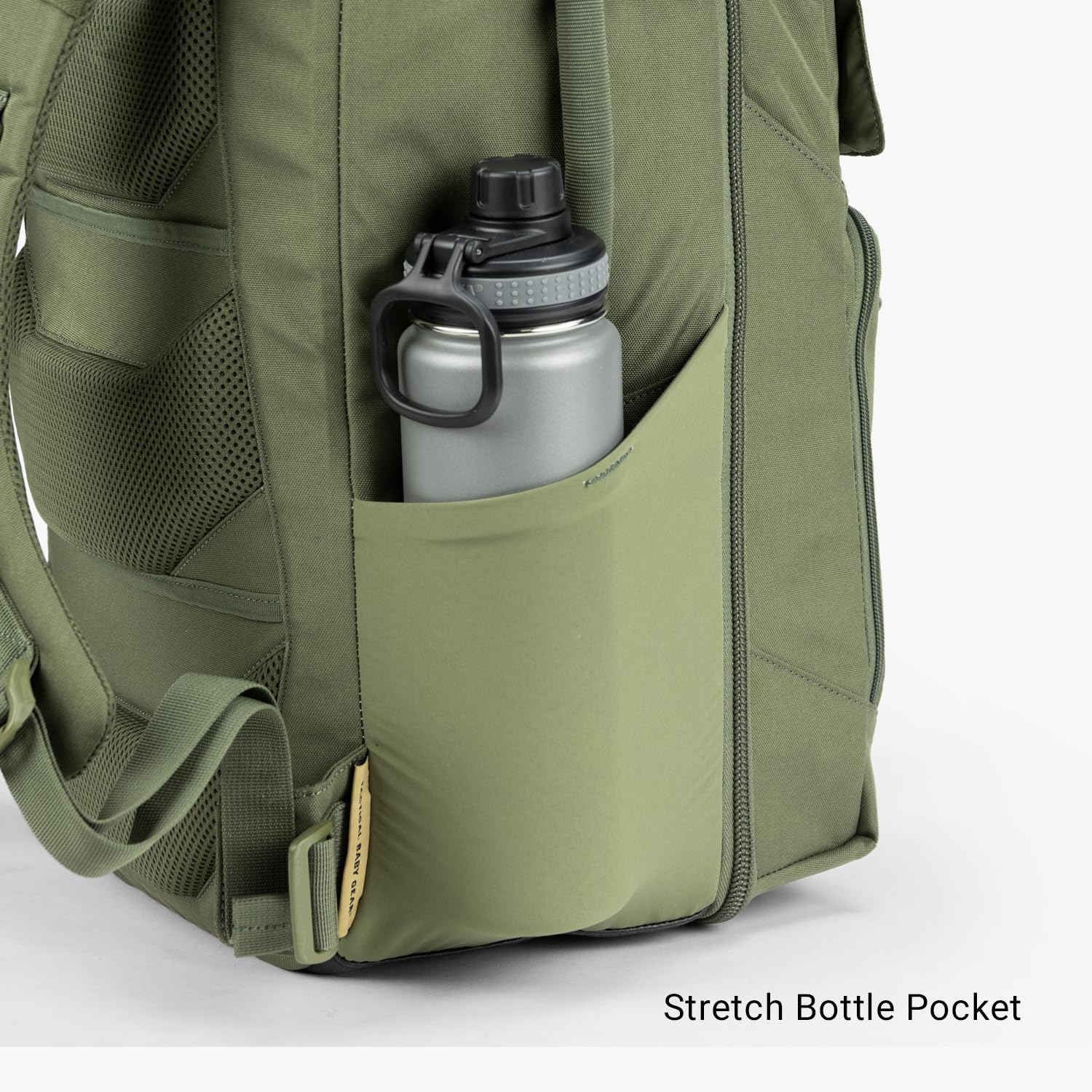 Tactical Baby Gear Everyday Diaper Bag rear pocket holds changing mat for clean changes.