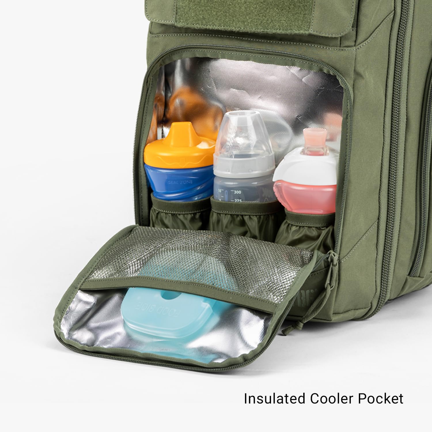 Tactical Baby Gear Everyday Diaper Bag wipes pocket with magnetic flap for fast access.