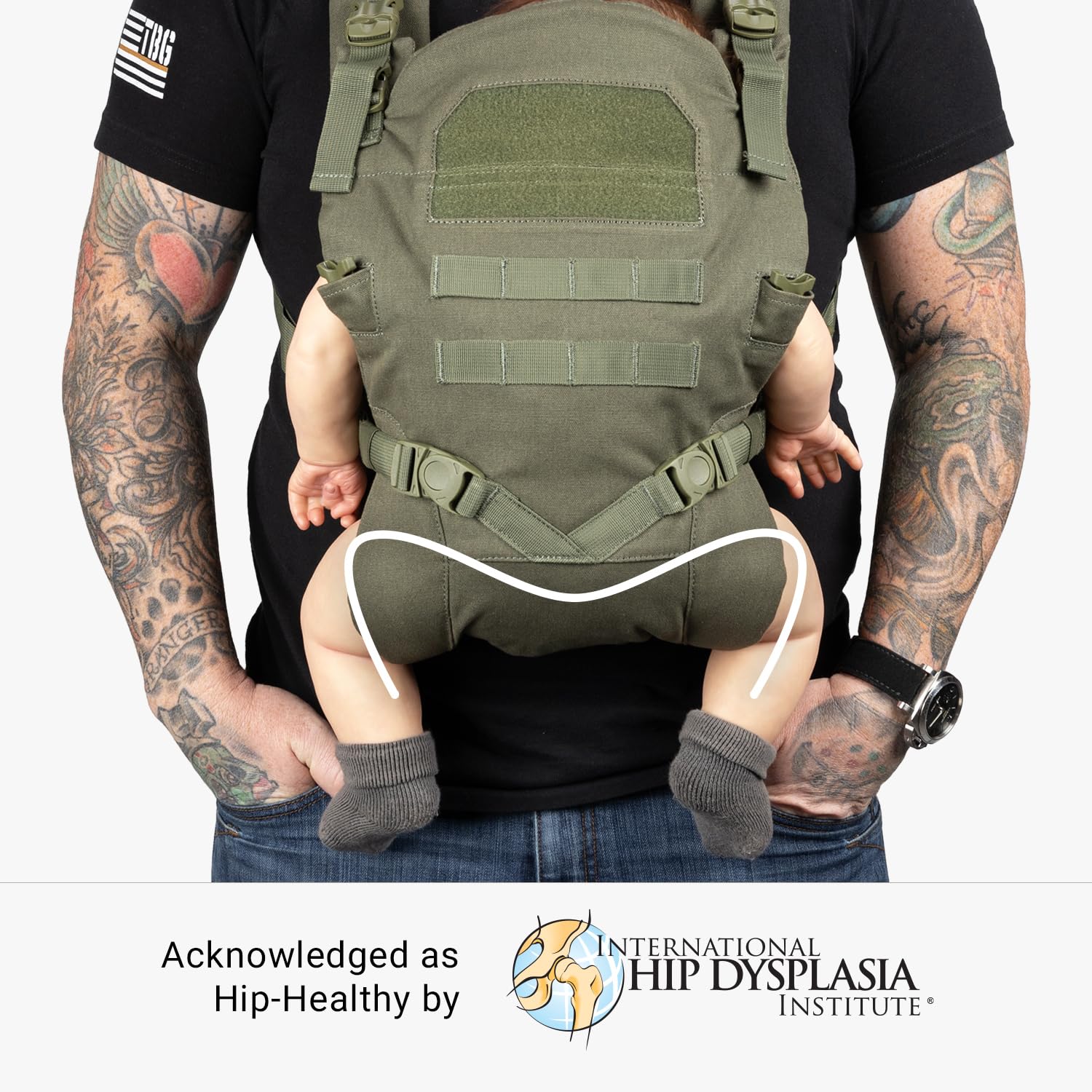 Tactical Baby Gear carrier shows UTX buckles for easy adjustment as baby grows.